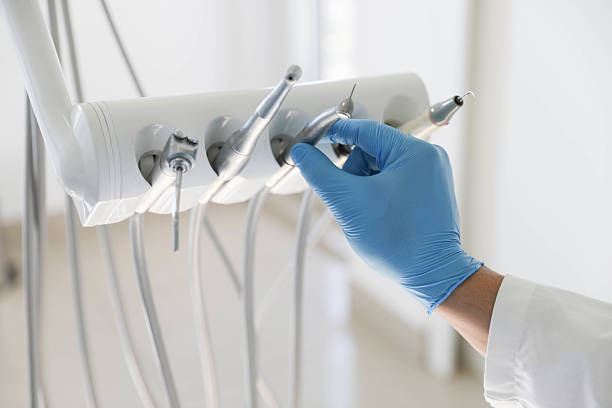 Professional Tooth Extraction technician working in Winfield, KS